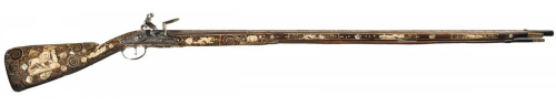 Ornate bone and pearl inlaid flintlock musket crafted by Ignatius Nester, 18th century.Sold at Aucti