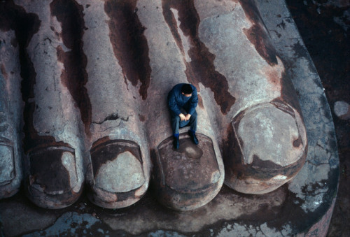 dolm: China. Loshan. 1980. The foot of a Buddha statue built in the 8th century. Bruno Barbey.