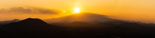 Hallasan Mountain and some of its many cinder cones at sunset, seen from Darangsi Oreum.