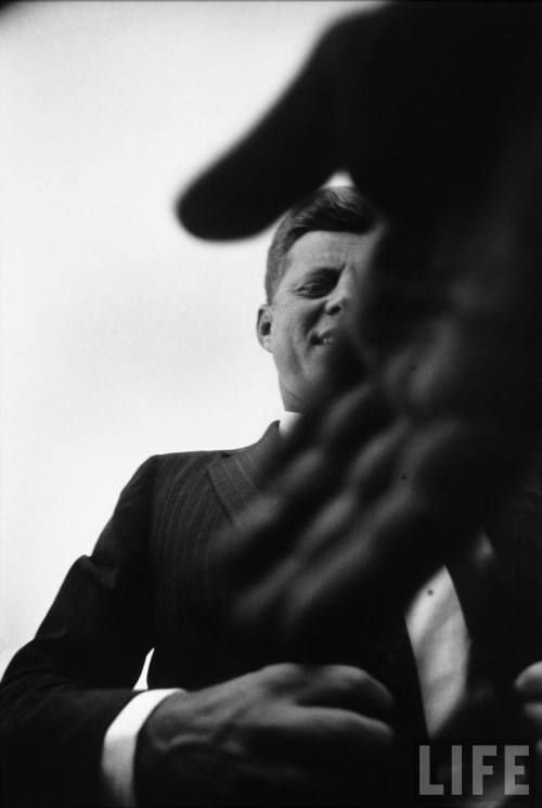 JFK, Jacqueline Kennedy 1957. JFK, 1961. Taken by Alfred Eisenstaedt for LIFE.shaking hands