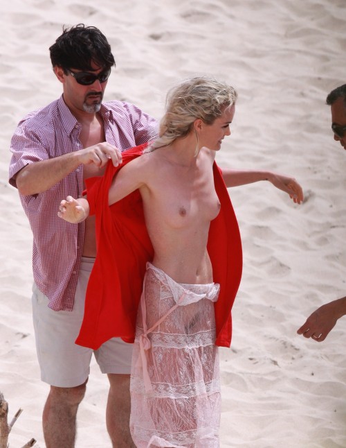 toplessbeachcelebs:  Laeticia Hallyday (Model) nude for a photoshoot on the beach (March 2009) 