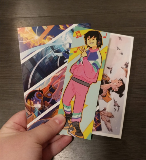 Hard copy proofs of our prints and bookmark have come in! Proofs of the rest of our merch to be expe