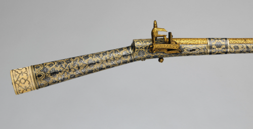Ornate gold, silver, and ivory decorated miquelet musket originating from the Caucuses, 19th century