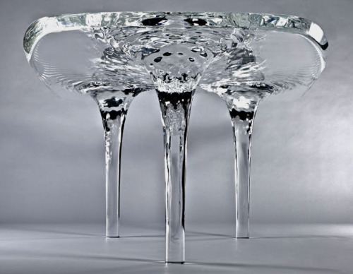 sixpenceee:  Mesa Table designed by Zaha Hadid, is a glass table that looks like flowing water. (Website)