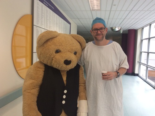 Portrait with hospital mascot. One of them is exhausted.