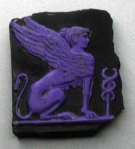 ancientanimalart:  Fragment of Cameo Glass Plaque 1st c. CE Roman “A winged sphinx sitting, turned t
