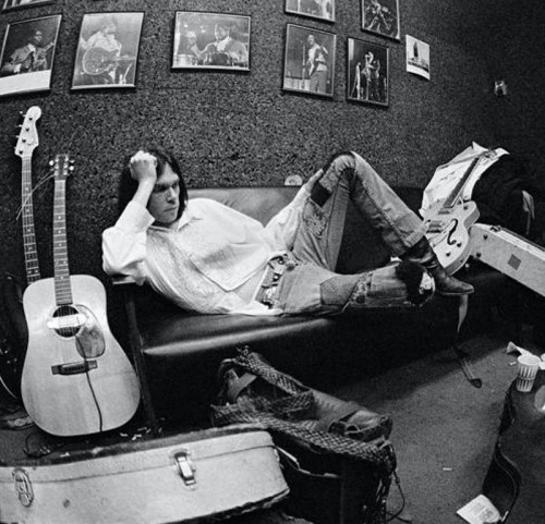 soundsof71:  Neil Young, backstage at the Electric Factory, Philadelphia, by Joel Bernstein. The uncropped version of this photo was used in the gatefold of After the Gold Rush, the #20 best-selling US album of 1971.