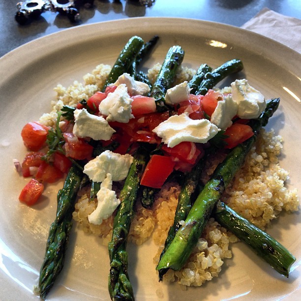 Todays lunch courtesy of the quick service restaurant at the culinary school where I work! Yum! Quinoa topped with grilled asparagus, tomato, onion, goat cheese and parsley. Yummy and filling! I also had a cup of delish tomato soup which really...