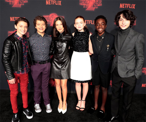 dailystrangerthings:The Stranger Things kids at season premieres over the years(2016 | 2017 | 2019)