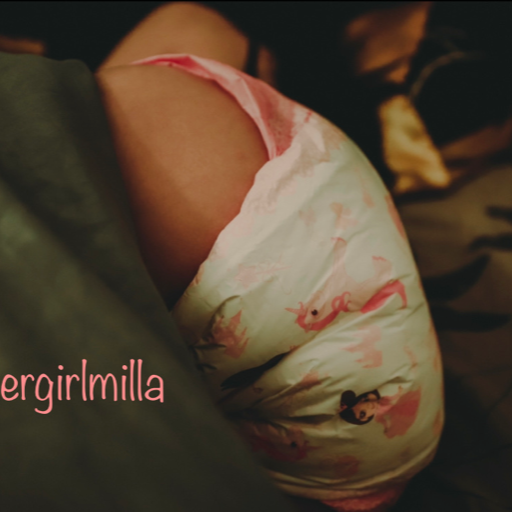 diapergirlmilla:A good thick diaper on. No underwear. The only right way to sit on the couch at night don&rsquo;t you think? 😍