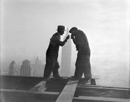 poetryconcrete:Workers lighting up cigarettes on skyscraper beam, photography by Corbis Bettmann, 19