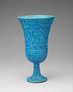 ancientpeoples:  Faience chalice  The chalice is shaped like a lotus flower and decorated with other floral elements. Also a river or stream, humans and animals are depicted on the chalice. It is 14.5 cm high (5 11/16 inch.)  Egyptian, 3rd Intermediate