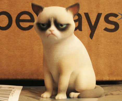 awesomeshityoucanbuyx:  3D Printed Grumpy Cat  I bet Grumpy Cat would be even grumpier if he’d knew there was a 3D printed version of himself, or he’d applaud the idea of printing something tolerable.  More cool things @: Awesome Sh*t You Can Buy