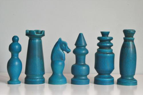 puppymush:designobjectory:Red and blue ceramic pieces from a chess set made by Nico Bongers during a