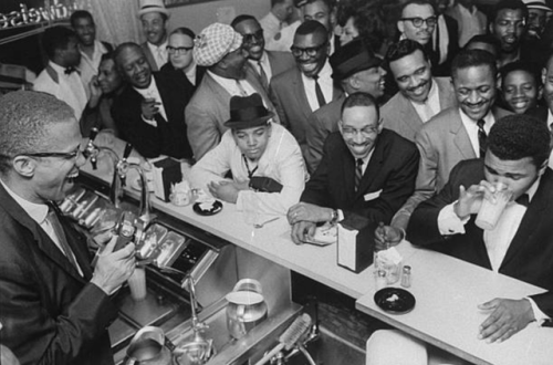 twixnmix:Muhammad Ali celebrating with Malcolm X at the Hampton House in Miami after he won the Worl