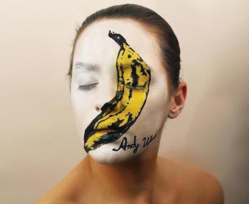 Painted faces showing famous album coversby Natalie Sharp