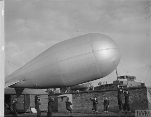 Ratings bring out an inflated barrage balloon, at Greenock or Gourock(Scotland, October 31st, 1941):