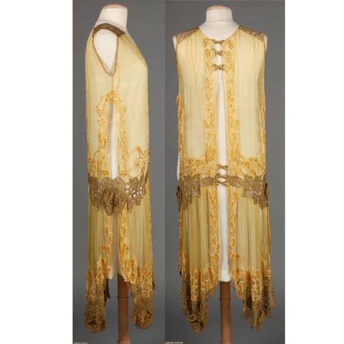 1928 c. Beaded yellow tabard of silk chiffon with gold lace shoulder straps and panel trim, yellow a