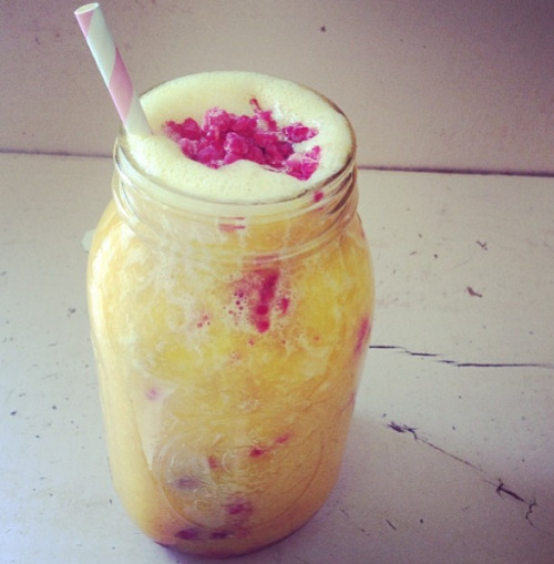 Freshly squeezed OJ blended with mango and raspberries