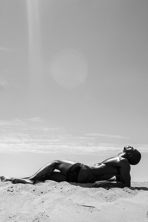 chriscruzism:  Model Chris Lylez represented by Silver Models and photographer Gregory Prescott come together for a super come back. Exuding a raw sensuality, a lean Chris hits the sand, modeling classic CK brief underwear in a black and white