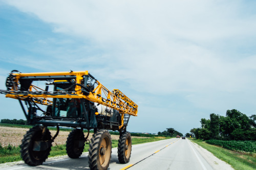 July 2, 2015- A tractor drives by in Illinois