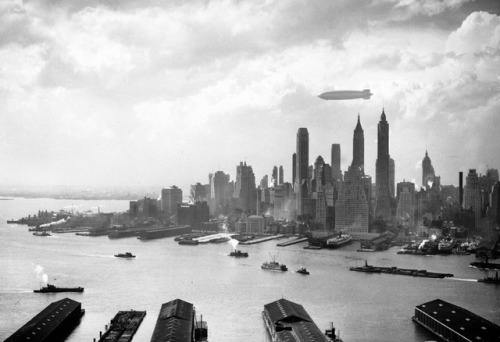 The Hindenburg flies over Manhattan on May 6th, 1937, just hours before it would catch fire and cras