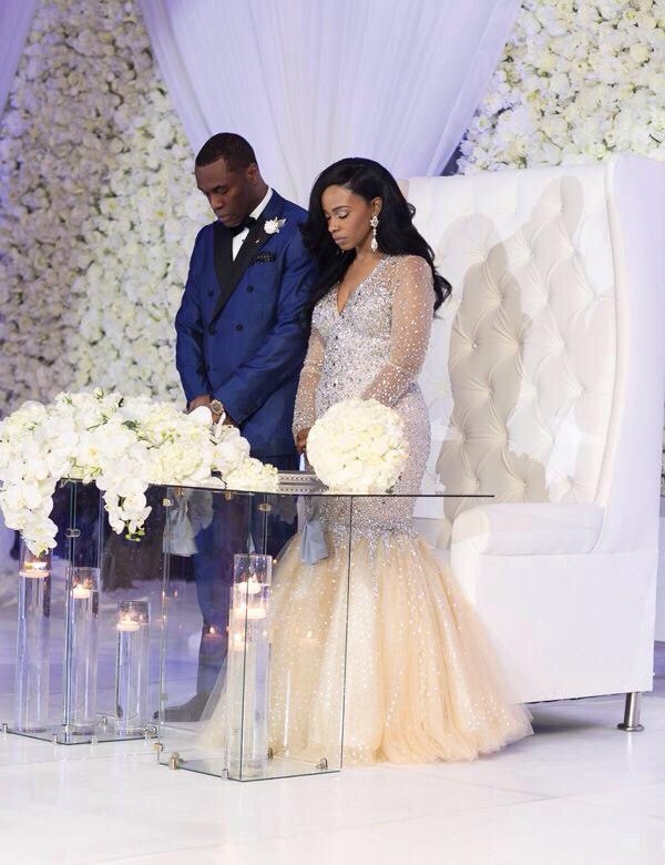 packtheammo:  urbansoulection:  Her wedding dress &amp; reception look has me