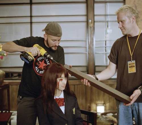 guts-and-uppercuts:Special effects artists affixing the table leg that would lead to her demise to C