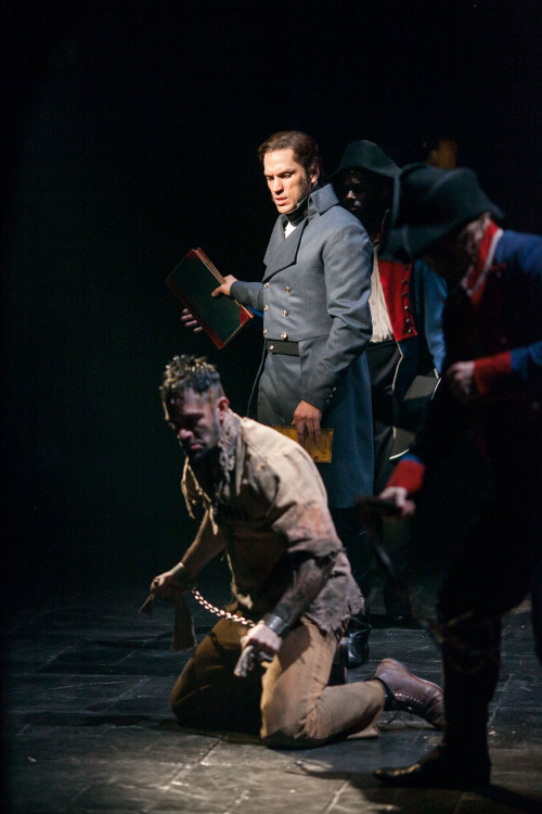 A view from the wings of Javert and Valjean’s first encounter in the Prologue. Photo by maxgordonpho