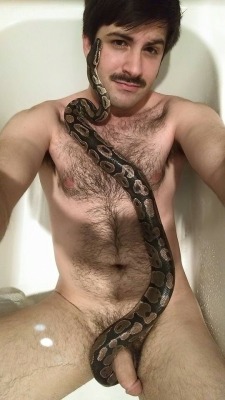 ponyxratedworld:  Man with Snake