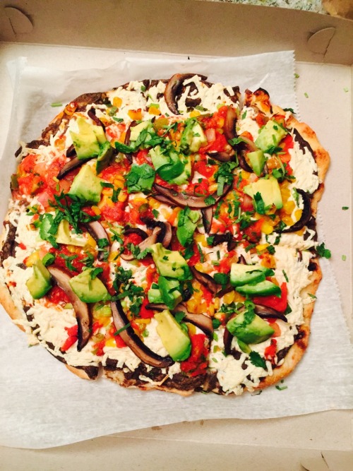 veganpizzafuckyeah:  bleedgreenblood:  Vegan “Tex Mex” Pizza  Green Leaf Vegan and Vegetarian Restaurant Framingham, MA  Ingredients: Refried beans, corn, portobello mushrooms, salsa, green onions, and vegan cheese on a grilled thin crust, topped