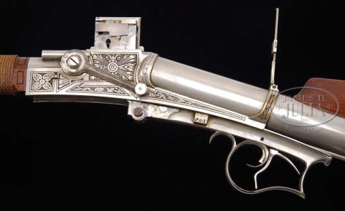 Extraordinary engraved Meigs slide action repeating rifle, circa 1880′s.from James A. Julia Auctions