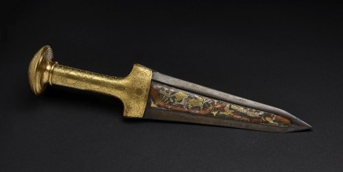 Reproduction of a Mycenean dagger, inlaid with cats hunting ducks, a river with fish and papyri. Cir