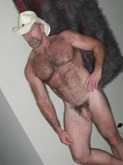 WOW he is a hairy, sexy looking man.  Definitely my kind of man!  WOOF