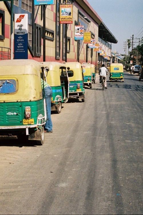 India 2013: A row of Autorickshaws.50mm, Nikon F4S, Kodak Portra 400.