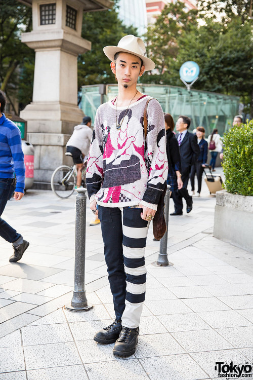22-year-old Shota on the street in Harajuku wearing a vintage sweater, pants from Qosmos Shibuya, an