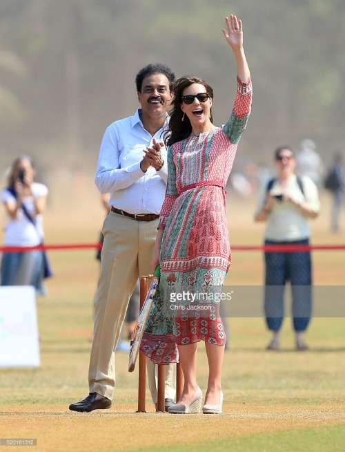 The Duchess of Cambridge shows her playful side as she plays cricket with children from Magic Bus, C