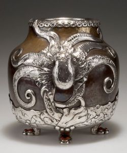 treasures-and-beauty: Eval Nielsen,  Copenhagen. Vase with octopus, 1915. Browned brass, silver mounting with octopus and leaves. Amber cabochons.   