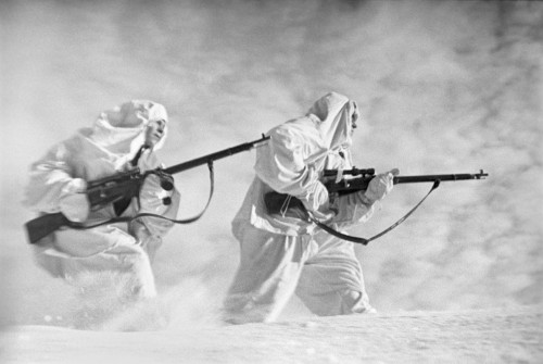 goodmorningleftside:historicaltimes:Two Soviet snipers in winter camouflage gear in the snow near Le