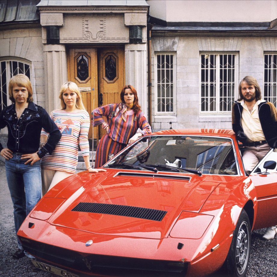 ABBA posing alongside a 1976 Maserati Merak SS Coupe, which belonged to members Benny Andersson and Anni-Frid Lyngstad.