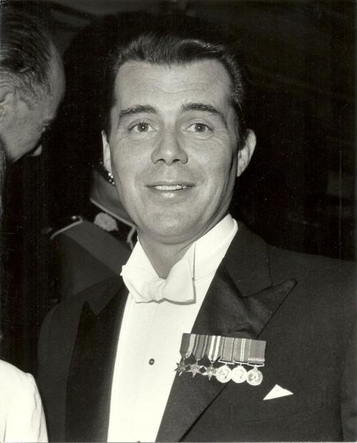 Dirk BogardePictured wearing miniatures of his military service medals, medals are as follows: (left