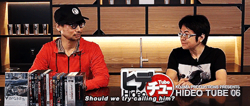 foyernormanchapel:Hideo magically summons Mads with his fanboy powers