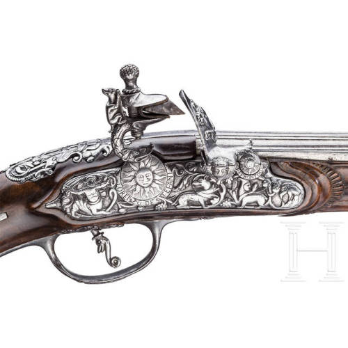 Engraved and chiseled flintlock pistol crafted by Lorenzo de Stefani, Italy, late 17th century.from 