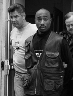 makaveli-immortalized:  History Repeats Itself (Tupac &amp; His Mother in Police custody) Please…wake me when I am free.I cannot bear captivity For, I would rather be stricken blind than to live without expression of mind. - Tupac Shakur 