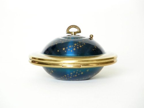 cair–paravel:Flying saucer compact by Kigu, England, 1950s.