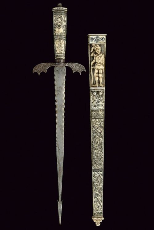 art-of-swords:  Engraved DaggerDated: 17th  centuryCulture: GermanMeasurements: overall length 51.5cmThe dagger has a straight, flame-shaped blade, on a side a strong raiser worked with woven chiselling, and the tip shaped as an arrow. The quillon is