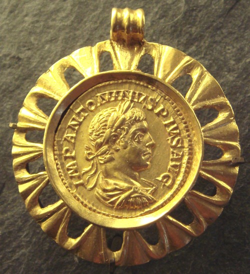 Gold medallion bearing a portrait of the Roman Emperor Elagabalus (r. 218-222 CE).  Now in the Louvr