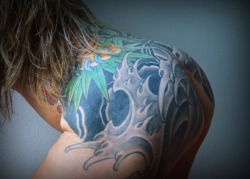 theburninglotus:  I love those waves but I have to tell you that it was very intense getting them. The day I got the piece outlined was long and exhausting… and an eye opener. The next session is when shading started - on my ass, no less - and I was