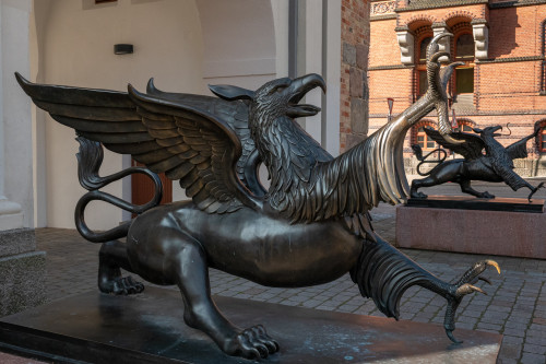 blondebrainpower:   In 2015 this pair of bronze griffins by the sculptor Ene Slawow were placed in front of the Stone Gate of the city of Rostock, Germany. Photograph by riesebusch