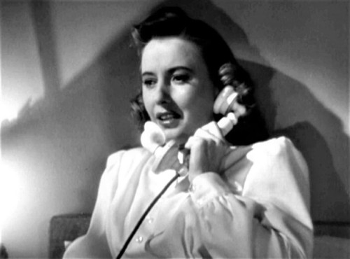 Barbara Stanwyck frantically calls her doctor - in “The Other Love” 1947.